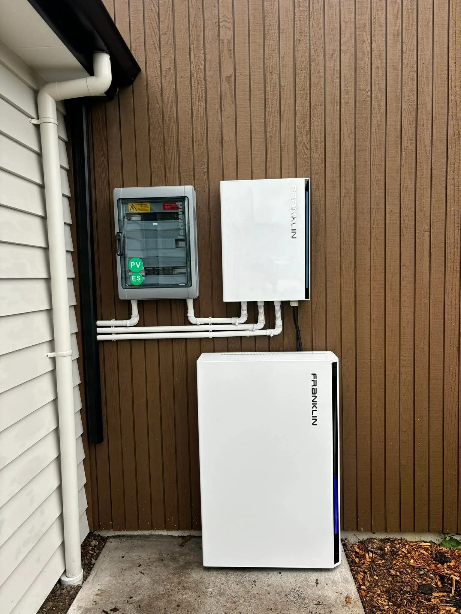 FranklinWH aPower home battery and gateway installed on the exterior wall of an Auckland home