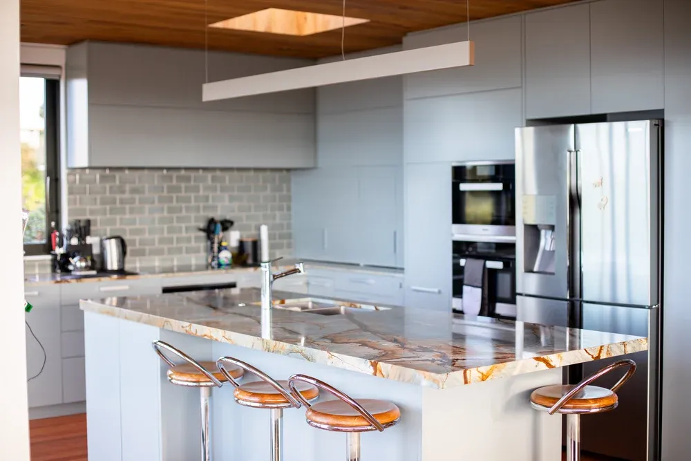 Modern Auckland kitchen lit by Vital Energy